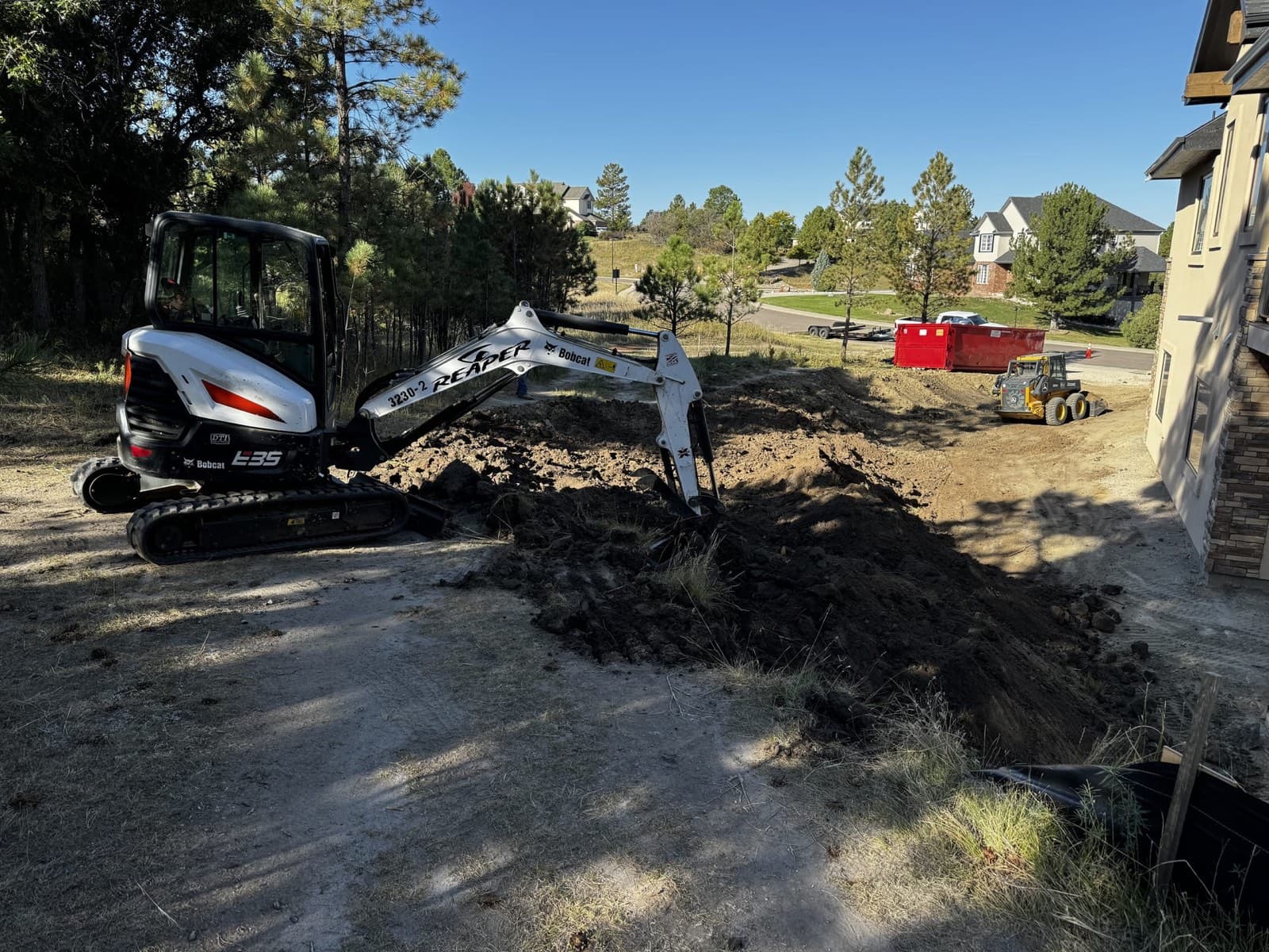 Earthwork and grading equipment on a Denver, Colorado sitework project